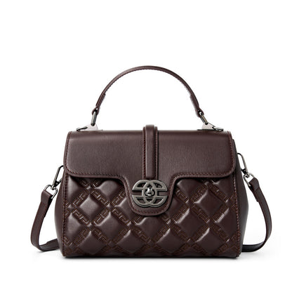 Brown quilted handbag with a brand logo on a white background