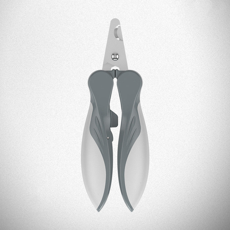 Gray pet nail clippers on a light gray background