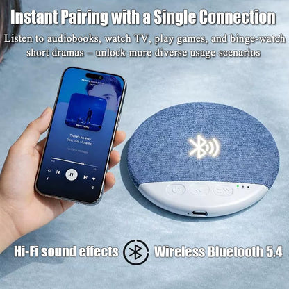 Bluetooth speaker with smartphone showing audio app on a blue background