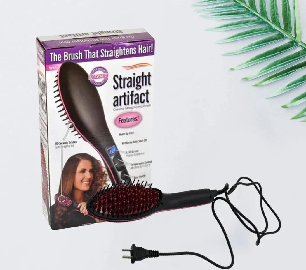 Hair straightening brush with packaging on a light background
