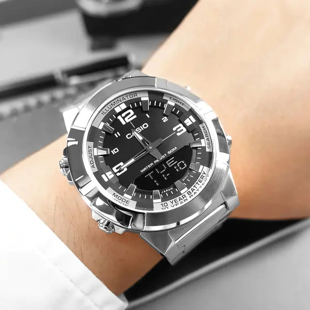 Casio watch on a wrist with a blurred background