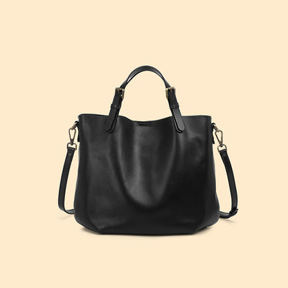 Black handbag on a beige background