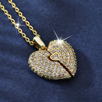 Gold and diamond heart-shaped pendant on a blue background