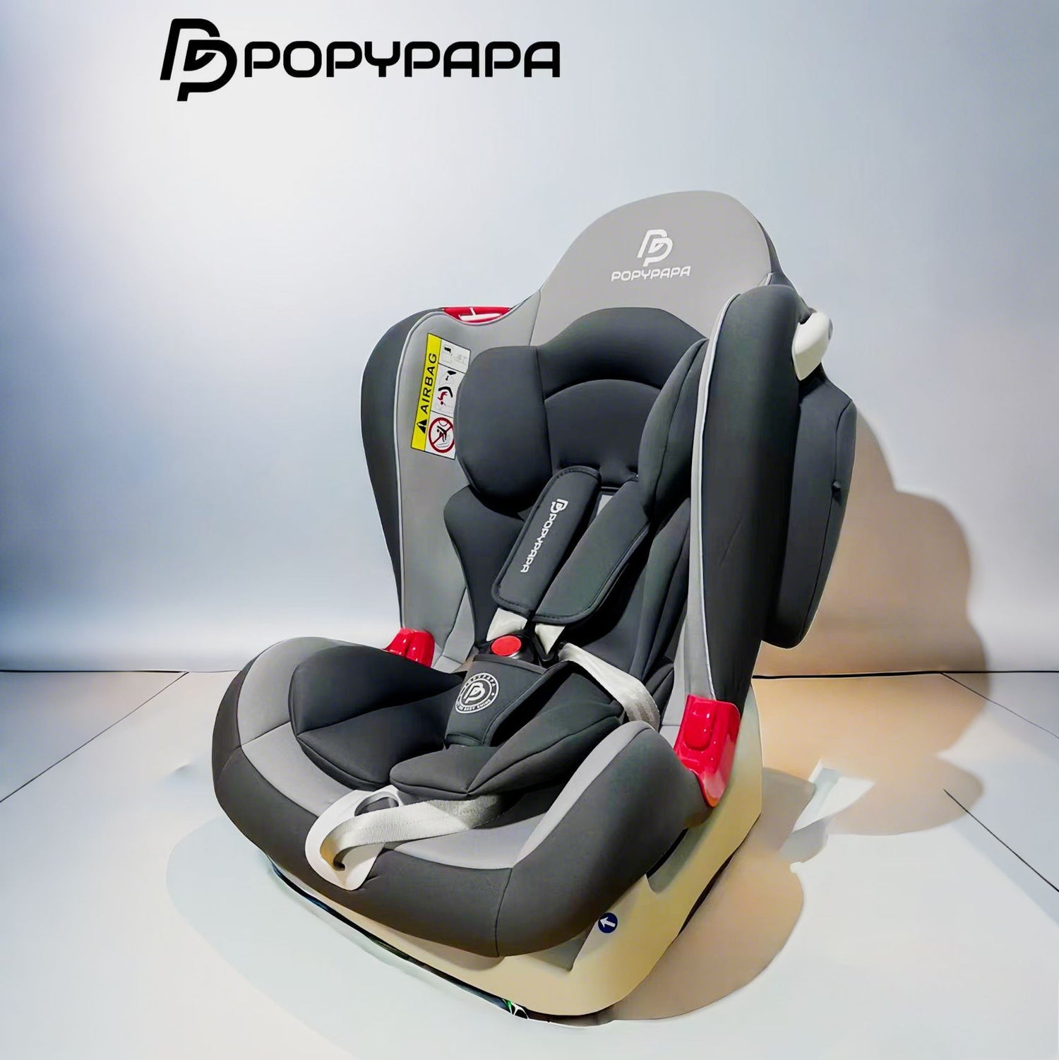 A Popypapa brand infant car seat in dark gray and black with red buckle accents, set against a clean studio background with the Popypapa logo in the top left corner.
