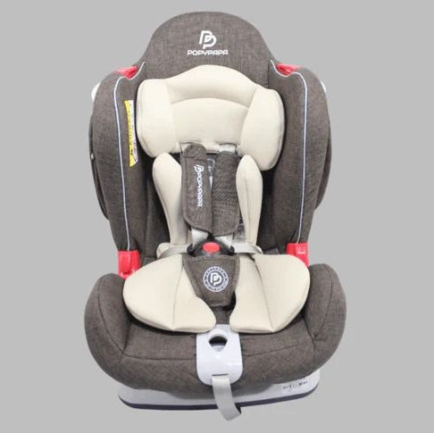 Child car seat with a gray and beige design on a gray background