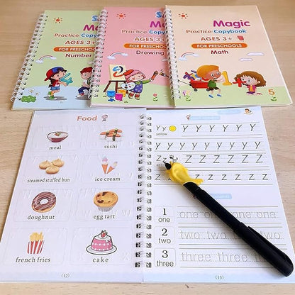 Educational books for preschoolers with a pen on a wooden surface