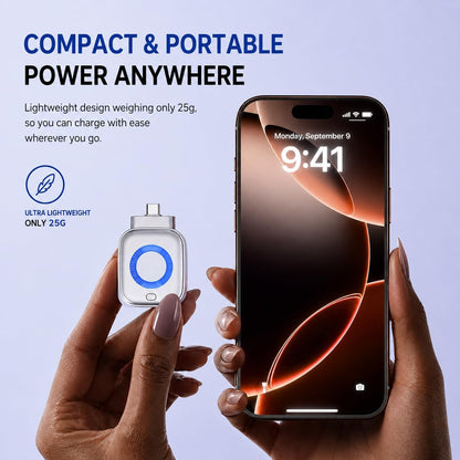 Hand holding a smartphone with a compact power bank on a light blue background